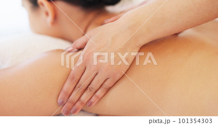 Relax, hand and therapist massage customer at luxury health and wellness spa for skincare and body treatment. Woman, physical therapy and hands on back for calm, stress relief and muscle tension 101354303