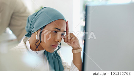 Hijab, headache and business woman burnout at a office computer feeling anxiety and stress. Finance employee, islam and muslim female at work doing tax audit at a computer worried about mistake Hijab, headache and business woman burnout at a office computer feeling anxiety and stress. Finance employee, islam and muslim female at work doing tax audit at a computer worried about mistake 101355768