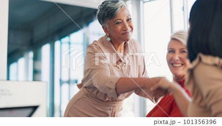 Meeting, handshake and collaboration with a business woman in partnership with her team in the boardroom. Welcome, teamwork and diversity with a female leader and employee group working in the office Meeting, handshake and collaboration with a business woman in partnership with her team in the boardroom. Welcome, teamwork and diversity with a female leader and employee group working in the office 101356396