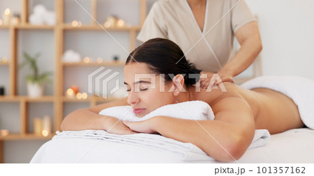 Spa massage, zen and relax customer at beauty salon for body wellness support, chakra energy healing and luxury healthcare. Masseuse woman, calm mindset and peace for client with candle aromatherapy Spa massage, zen and relax customer at beauty salon for body wellness support, chakra energy healing and luxury healthcare. Masseuse woman, calm mindset and peace for client with candle aromatherapy 101357162