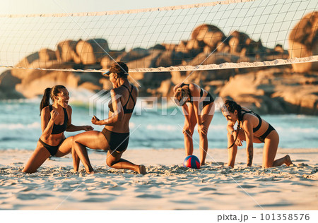 Volleyball, beach and winner with a friends team in celebration of a win on the sand during summer. Teamwork, motivation and competition with sports woman by the sea or ocean for a partner game 101358576