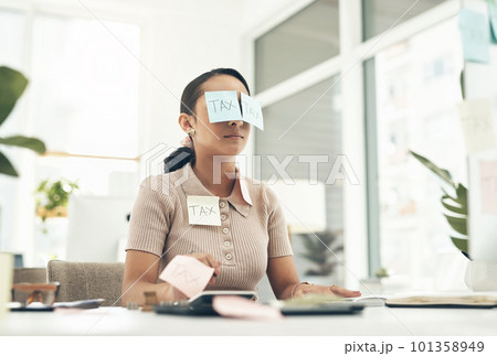 Tax, audit and finance business woman sleeping, taking nap and working at a desk in an office at work. Tired, corporate and accounting employee looking stressed and dealing with financial problem 101358949
