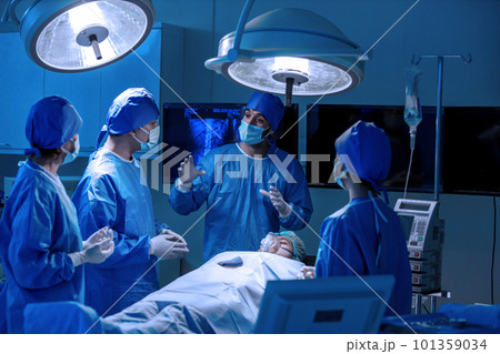 Team of surgeons is fighting for life. Team of surgeons is fighting for life. 101359034