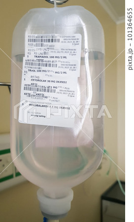 Hanging pillar and Saline solution fluid iv bag in emergency room at  hospital.right copy space Stock Photo