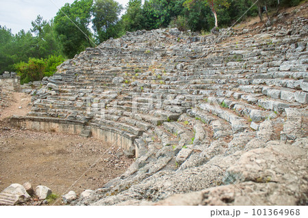 Stone amphitheater in the ancient city Phaselis. Turkey, Antalya Stone amphitheater in the ancient city Phaselis. Turkey, Antalya 101364968