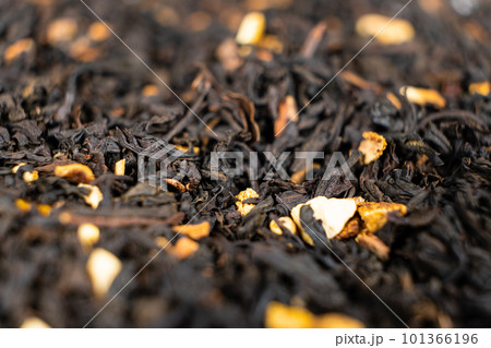 Black tea with orange peel and cinnamon close-up top view Black tea with orange peel and cinnamon close-up top view 101366196