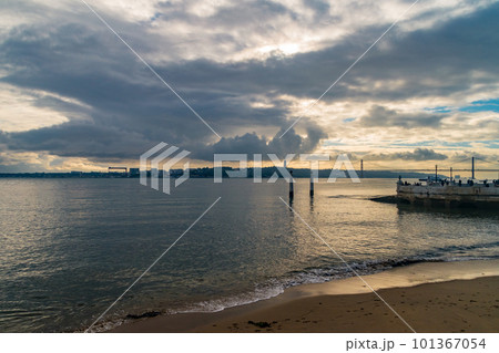 Sunset view on Tagus river in Lisbon, Portugal. 101367054