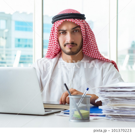 Arab businessman working in the office Arab businessman working in the office 101370223