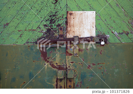 Door of the prison barricaded with padlock high security metal lock 101371826