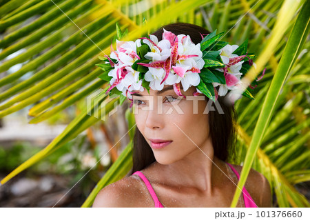 Tahiti beauty woman wearing flower head wreath traditional Tahitian cultural accessory. Bora Bora, French Polynesia. Beautiful Asian multiracial girl. Tahiti beauty woman wearing flower head wreath traditional Tahitian cultural accessory. Bora Bora, French Polynesia. Beautiful Asian multiracial girl. 101376660