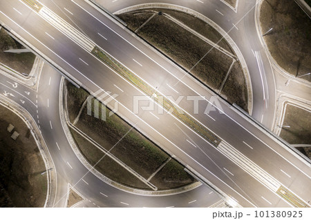 aerial view of highway junctions with roundabout 101380925