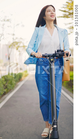 woman commuting with bike woman commuting with bike 101381008