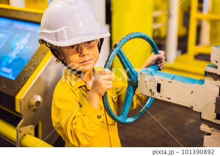 Boy operator recording operation of oil and gas process at oil and rig plant, offshore oil and gas industry, offshore oil and rig in the sea, operator monitor production process, routine daily record 101390892