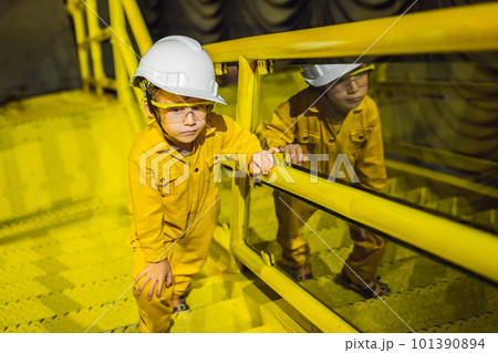 Boy operator recording operation of oil and gas process at oil and rig plant, offshore oil and gas industry, offshore oil and rig in the sea, operator monitor production process, routine daily record 101390894
