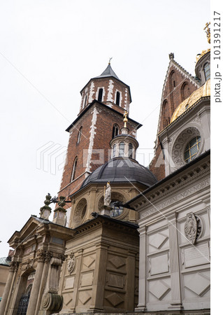 Royal Wawel royal castle in Krakow in rainy early spring weather in Poland. historic castle in the old city Gardens and cathedra, Cracow, Poland. Travel attraction Royal Wawel royal castle in Krakow in rainy early spring weather in Poland. historic castle in the old city Gardens and cathedra, Cracow, Poland. Travel attraction 101391217