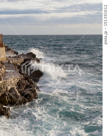 Waves hitting French Riviera rocks in Nice Waves hitting French Riviera rocks in Nice 101391612
