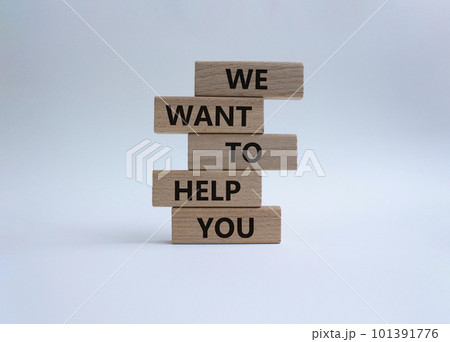 We want to help you symbol. Wooden blocks with words We want to help you. Beautiful white background. Business and We want to help you concept. Copy space. 101391776