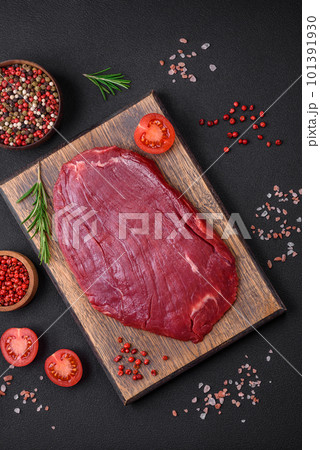 Fresh raw beef with salt, spices and herbs Fresh raw beef with salt, spices and herbs 101391930