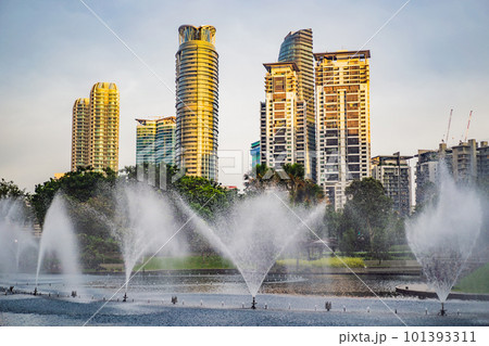 Fountain on the lake in the evening, near by Twin Towers with city on background. Kuala Lumpur, Malaysia 101393311