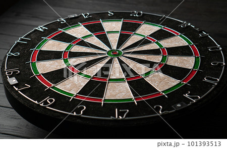 The new classic professional sisal dart target. Close-up, angle view. The new classic professional sisal dart target. Close-up, angle view. 101393513