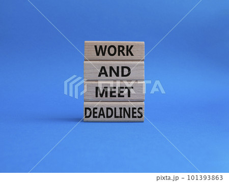 Work and deadline symbol. Concept words Work and meet deadlines on wooden blocks. Beautiful blue background. Business and Work and meet deadlines concept. Copy space. Work and deadline symbol. Concept words Work and meet deadlines on wooden blocks. Beautiful blue background. Business and Work and meet deadlines concept. Copy space. 101393863