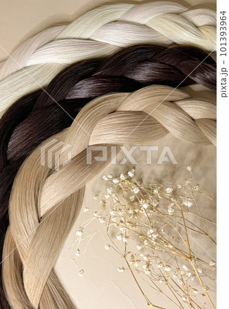 Strands of natural hair of different colors for extensions. Hair color palette 101393964