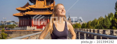 Enjoying vacation in China. Young woman in Forbidden City. Travel to China concept. Visa free transit 72 hours, 144 hours in China BANNER, LONG FORMAT 101394192