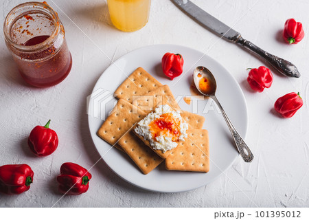 Crackers with Cream Cheese and Hot Pepper Jam Crackers with Cream Cheese and Hot Pepper Jam 101395012