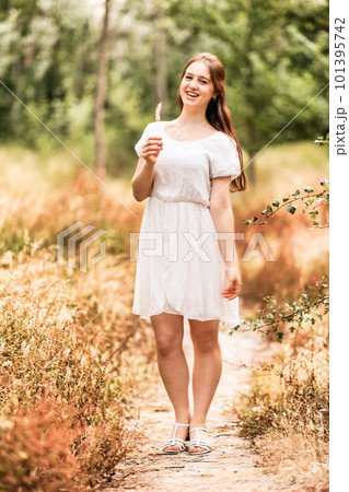 Young woman enjoy nature in autumn season. Lifestyle female portrait elegance retro fashion 101395742