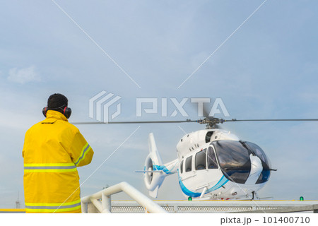 helicopter landing officer and alarm for the air rescue service. Team of rescuers medical helicopter 101400710