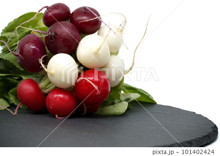 Bunch of fresh radishes over white background 101402424