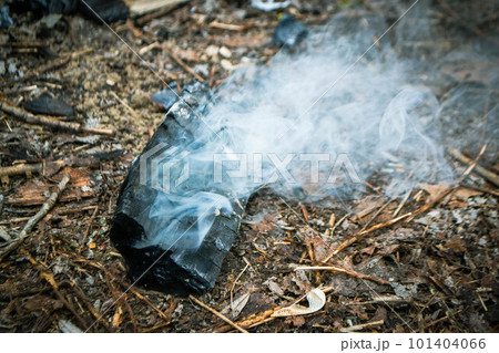 A piece of broken glass with smoke coming out of it. High quality photo A piece of broken glass with smoke coming out of it. High quality photo 101404066