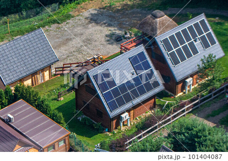 Historic farm house with modern solar panels on roof and wall High quality photo Historic farm house with modern solar panels on roof and wall High quality photo 101404087