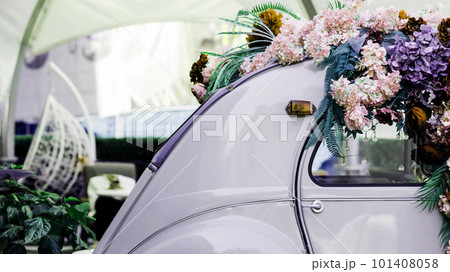 old vintage car decorated with flowers 101408058