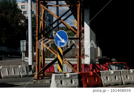 Blue arrow sign showing the way Blue arrow sign showing the way 101408059