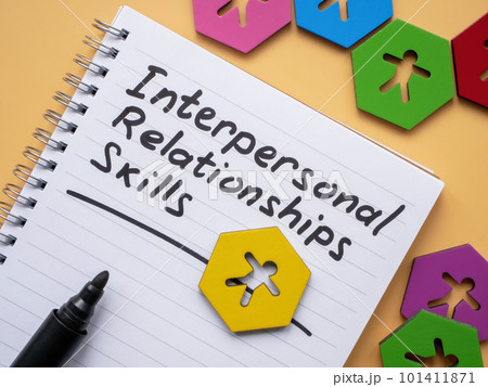 Page with inscription Interpersonal Relationships skills and figurines. 101411871