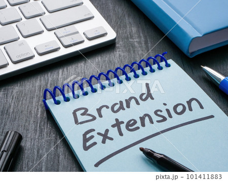 Open notepad with handwritten inscription brand extension. 101411883