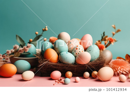 Easter card with multicolored eggs in wicker basket with flowers pastel toned on blue background. 101412934