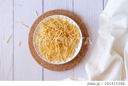 potato straw on white table flat lay potato straw on white table flat lay 101413386