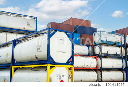 Chemical tank container. ISO tank container for chemical delivery. Bulk liquid transport. Chemical company. Container freight area. Global logistics business. Chemical container for truck transport. 101415065
