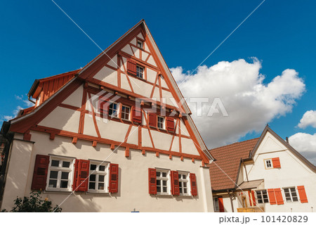 Traditional small house with beautiful outdoor decor facade in Germany. German old brick building house ancient European city German architect 101420829