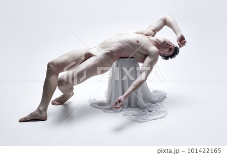 Portrait of handsome mature man posing shirtless against white studio background. Relief, muscular body in underwear 101422165