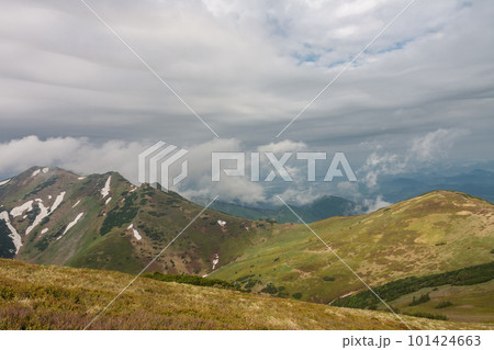 Maly Krivan, mountain in Mala Fatra, Slovakia, view from mountain Pekelnik, in spring cloudy day Maly Krivan, mountain in Mala Fatra, Slovakia, view from mountain Pekelnik, in spring cloudy day 101424663