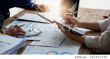 Group of Business People Meeting analysis financial plan, discussion, research with paperwork at office, accounting concept 101432330