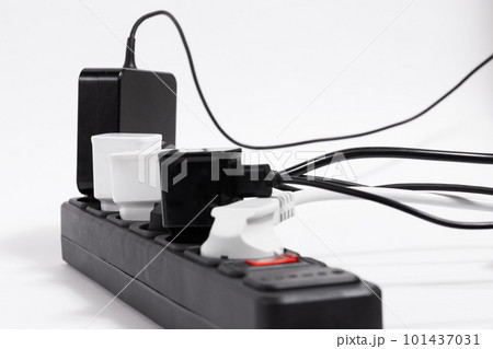 Black extension cord with red power on off button and many plugs Black extension cord with red power on off button and many plugs 101437031