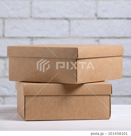 Two kraft cardboard boxes on the table Two kraft cardboard boxes on the table 101438101