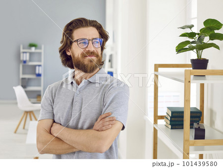 Portrait of confident satisfied business man looking away reflecting on good vision of future. 101439580