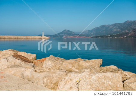 Small lighthouse in mediterranean sea in Montenegro, focused on stone Small lighthouse in mediterranean sea in Montenegro, focused on stone 101441795