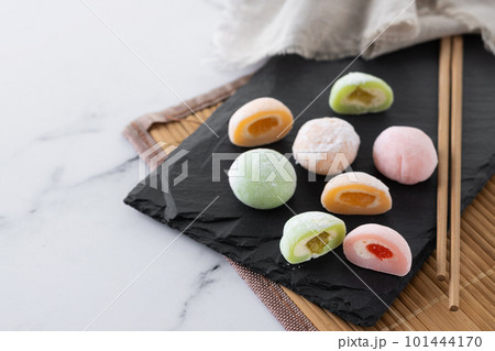 Japanese colorful mochi on marble background Japanese colorful mochi on marble background 101444170