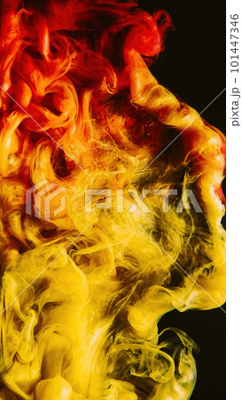 Paint splash. Ink water. Fluid mix. Hot burst. Bright red yellow orange color gradient vapor cloud on dark black abstract background. Paint splash. Ink water. Fluid mix. Hot burst. Bright red yellow orange color gradient vapor cloud on dark black abstract background. 101447346